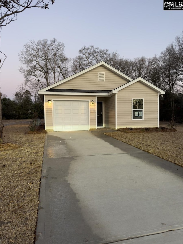 view of front of home featuring a garage