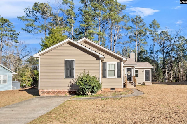 bungalow-style house with a front yard