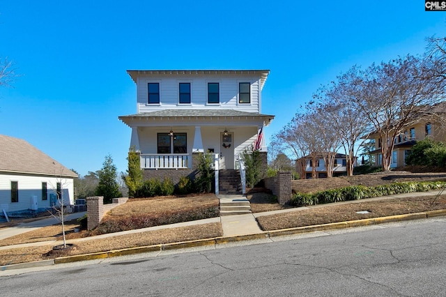 view of front of property featuring covered porch