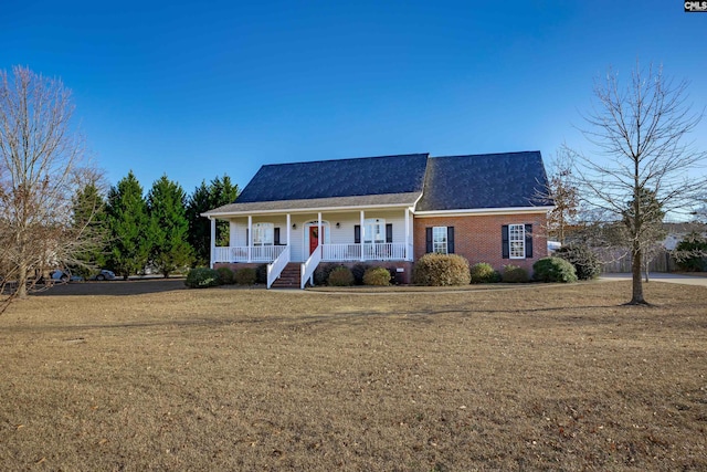 ranch-style home with a front lawn