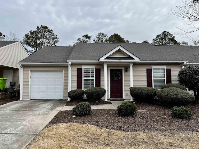 view of front of property featuring a garage