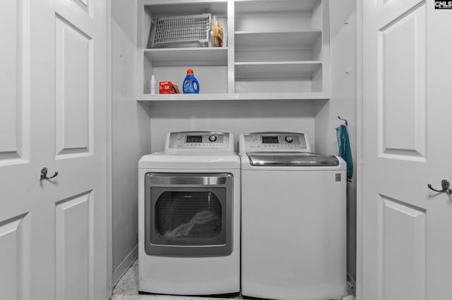 laundry room with washer and clothes dryer