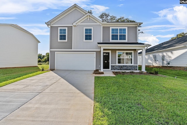 view of front facade featuring a garage and a front yard