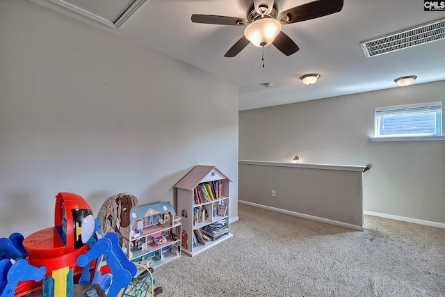 playroom with carpet flooring and ceiling fan