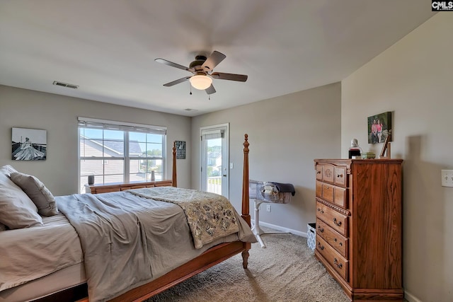 bedroom with carpet flooring, access to outside, and ceiling fan