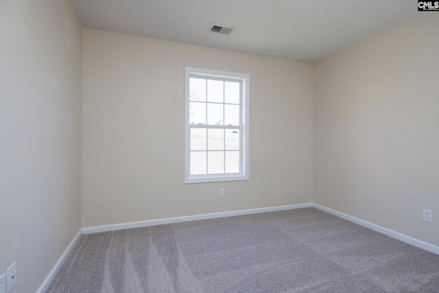 view of carpeted spare room