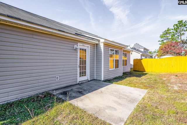 exterior space featuring a yard and a patio area