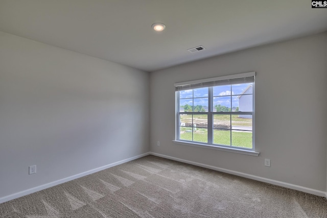 view of carpeted spare room