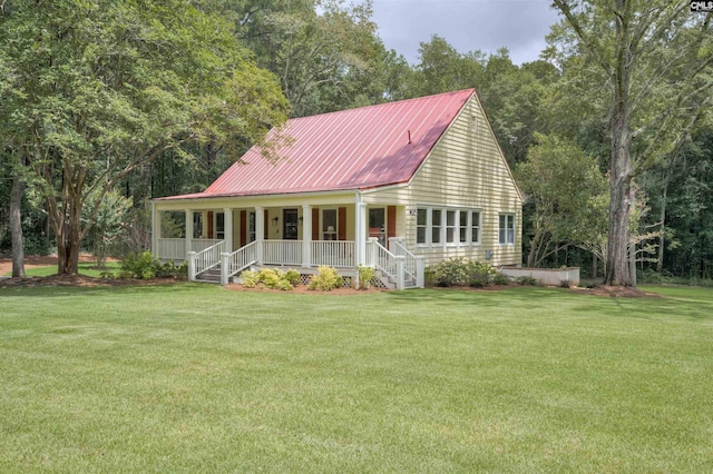 view of front facade with a front lawn and a porch