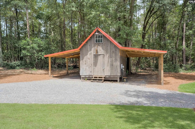 view of outdoor structure with a lawn