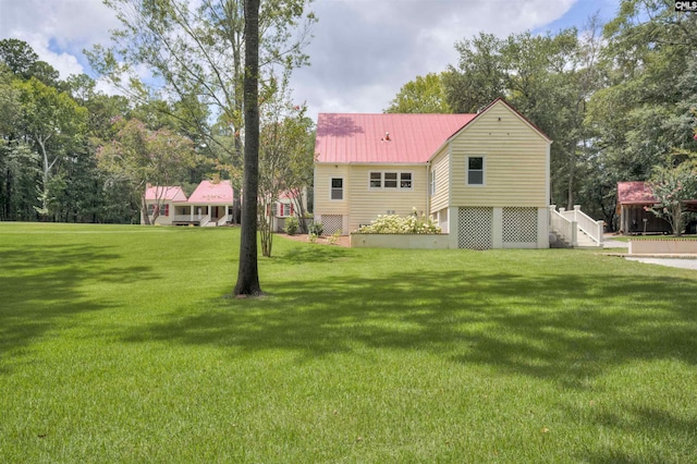 exterior space featuring a lawn