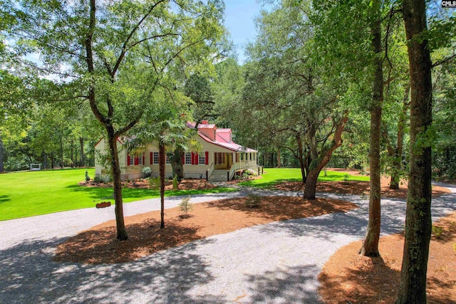 view of front of home with a front yard