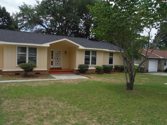 single story home with a front yard