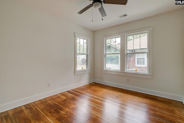 unfurnished room featuring ceiling fan and light hardwood / wood-style floors