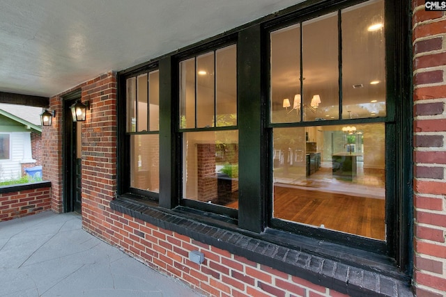 doorway to property featuring covered porch