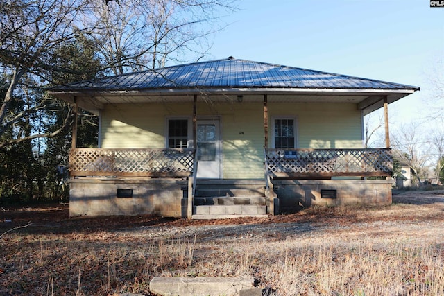 view of front of home featuring covered porch