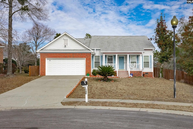 single story home featuring a porch and a garage