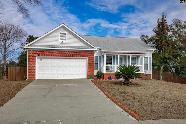 ranch-style house featuring a porch, a garage, and a front lawn