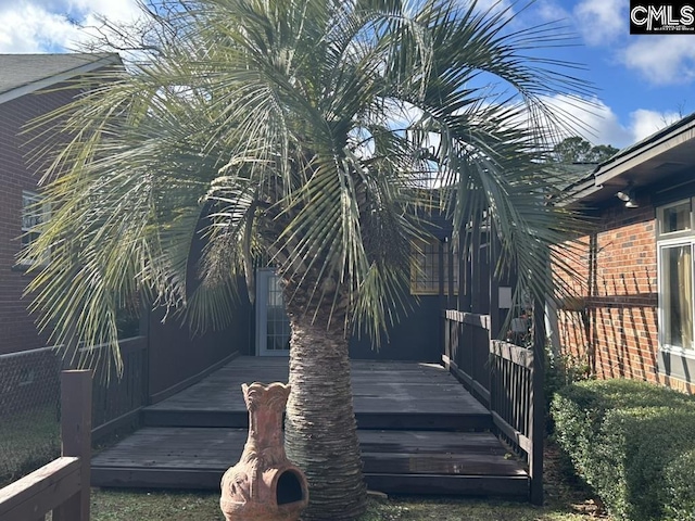 exterior space featuring a wooden deck