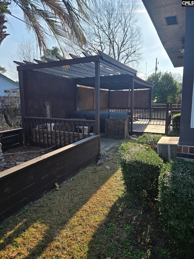 view of yard featuring central air condition unit