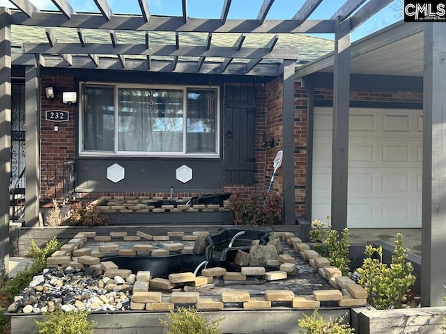 entrance to property featuring a garage