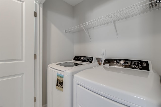 laundry room featuring washer and dryer