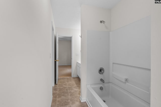 bathroom featuring vanity and washtub / shower combination