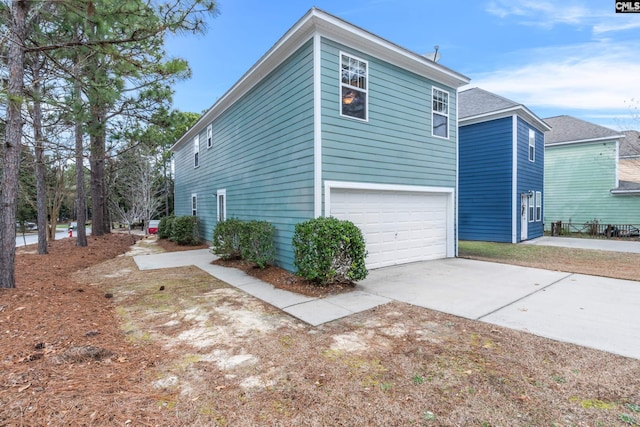 view of home's exterior featuring a garage