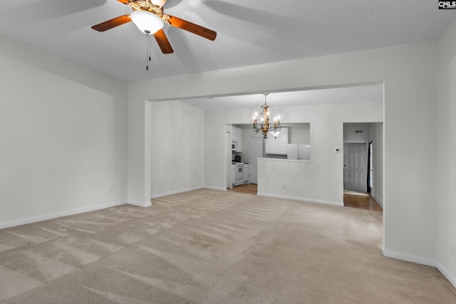 unfurnished living room with light colored carpet and ceiling fan with notable chandelier