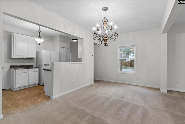 interior space featuring light colored carpet and an inviting chandelier