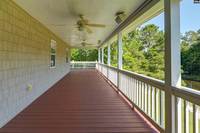 wooden deck with ceiling fan