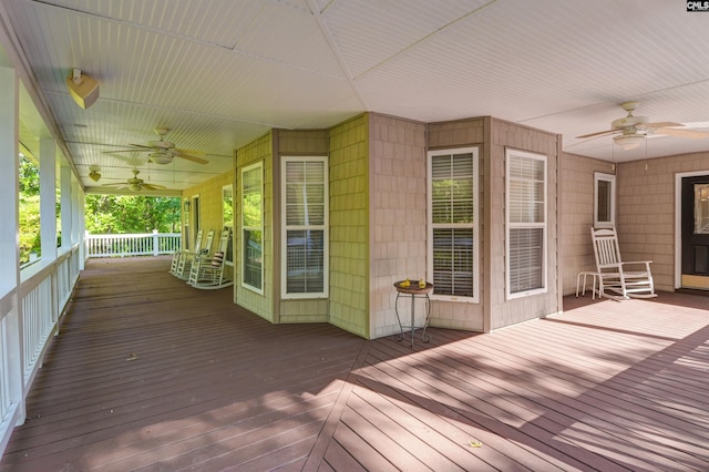 deck featuring ceiling fan and a porch