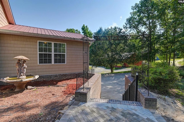 view of home's exterior featuring a patio area