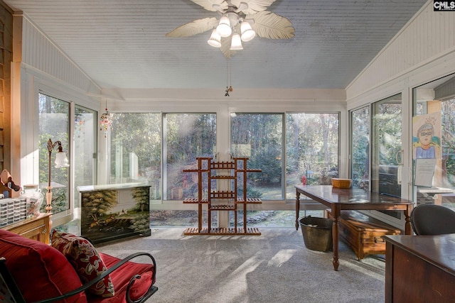 sunroom / solarium with vaulted ceiling and ceiling fan