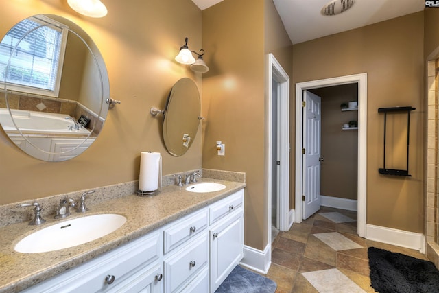 bathroom featuring vanity and a bathtub