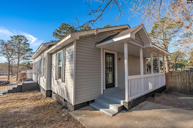 view of home's exterior with a porch