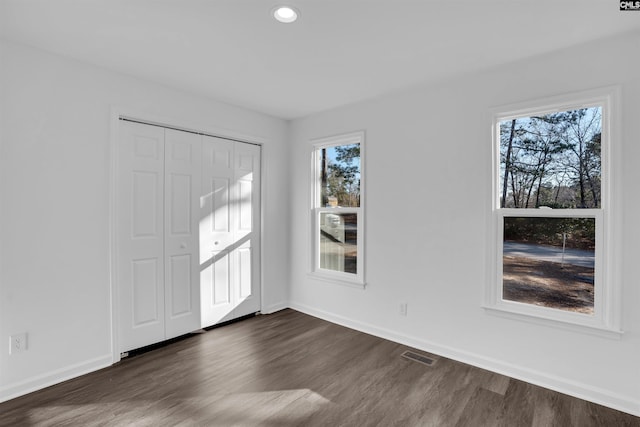 entryway featuring dark wood-type flooring