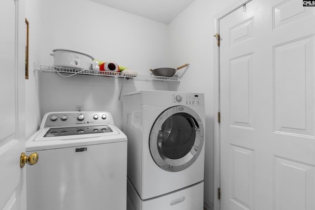 clothes washing area with independent washer and dryer