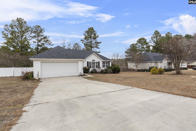 single story home with a garage and a front lawn