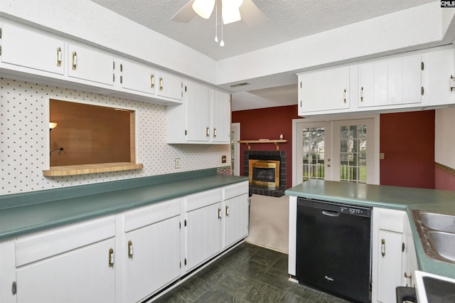 kitchen featuring dishwasher, ceiling fan, french doors, white cabinets, and stove