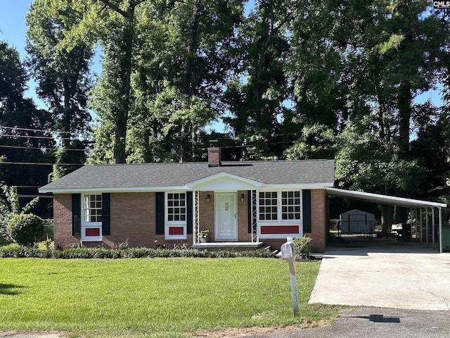 ranch-style house with a carport and a front lawn