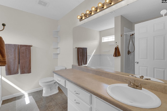 bathroom featuring vanity, tile patterned floors, curtained shower, and toilet