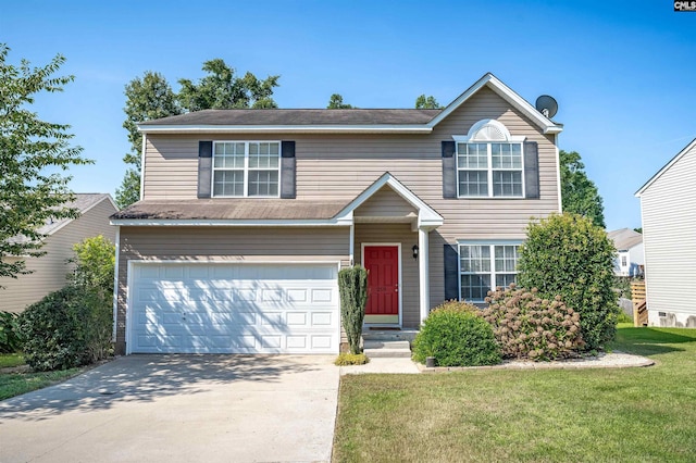 view of front of property featuring a front yard and a garage