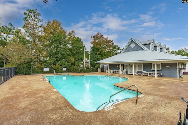 view of pool featuring a patio area