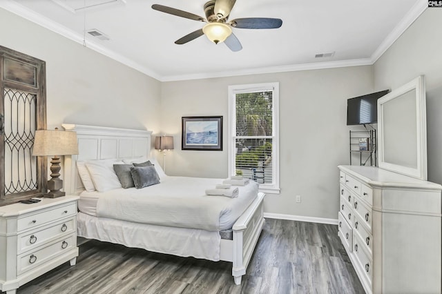 bedroom featuring ceiling fan, crown molding, and dark hardwood / wood-style floors