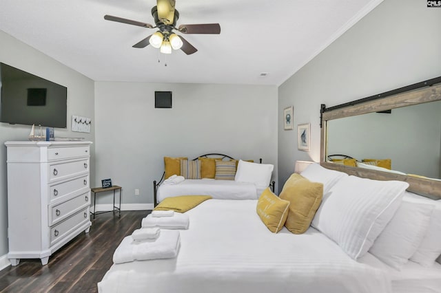 bedroom with ceiling fan and dark wood-type flooring