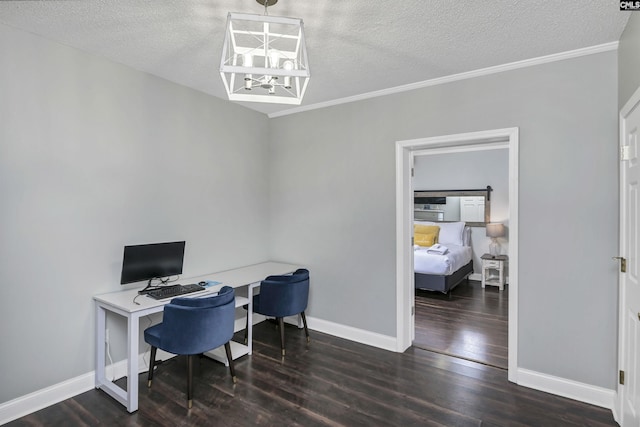 office space with a textured ceiling, dark hardwood / wood-style flooring, a notable chandelier, and ornamental molding