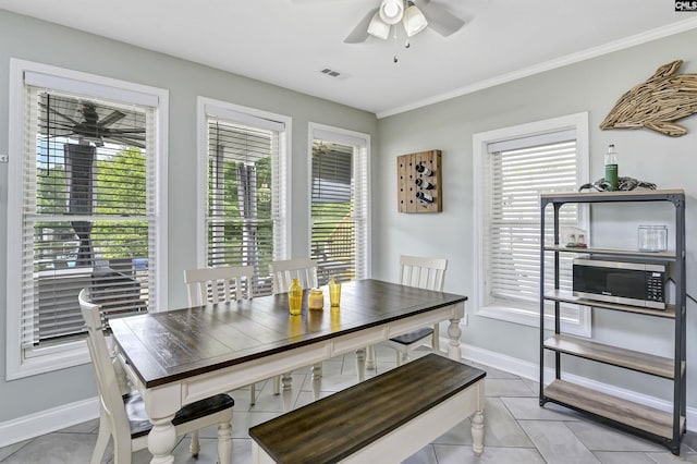 dining space with ceiling fan