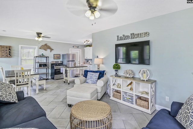 tiled living room with ceiling fan