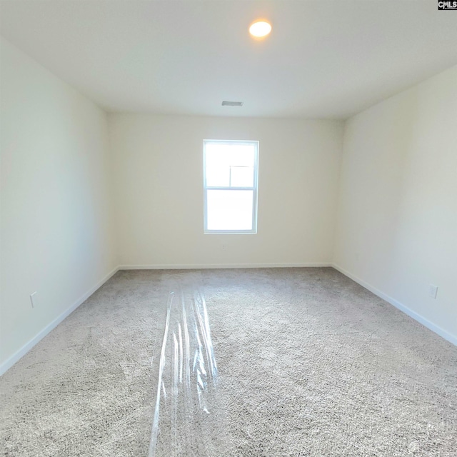 empty room featuring carpet